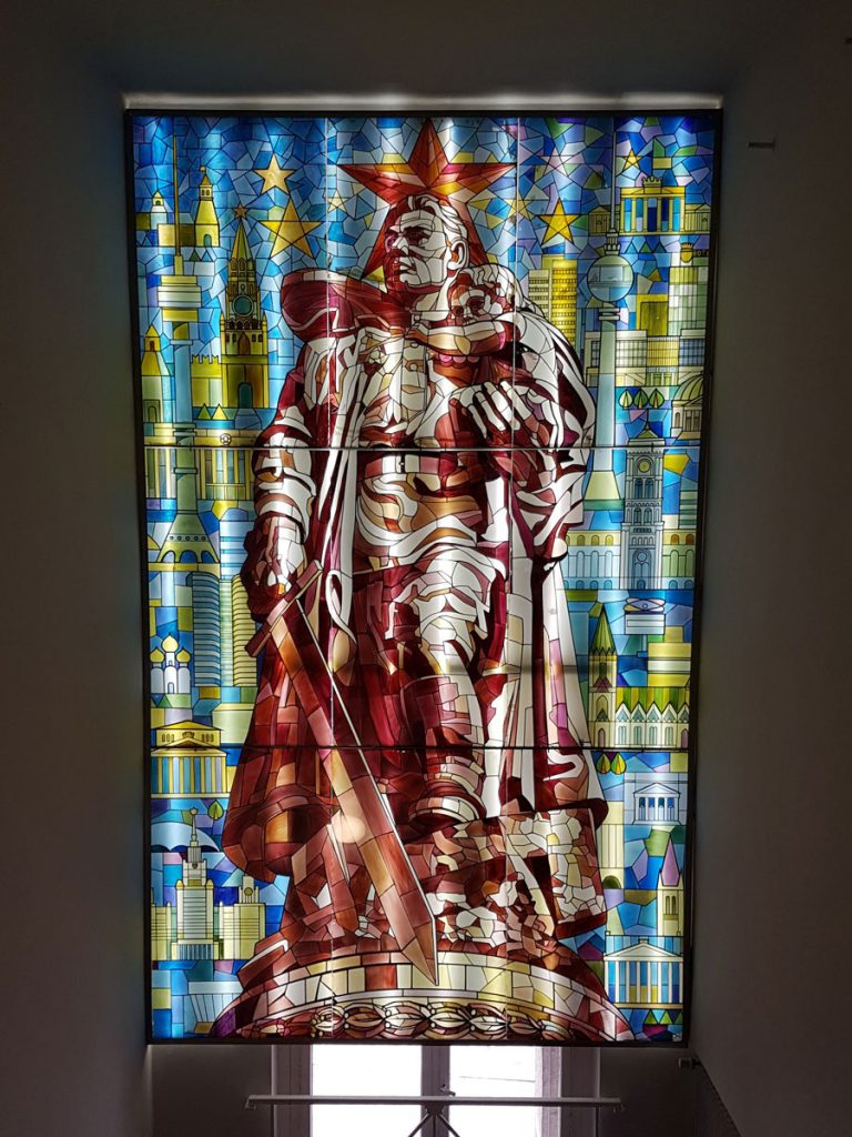 stained-glass-of-Soviet-soldier-holding-child